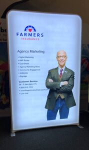 A lightbox advertisement for Farmers Insurance Agency Marketing. It lists services such as digital marketing, guest share, and customer engagement, and provides contact information including phone number, email, customer service hours, and live chat availability.